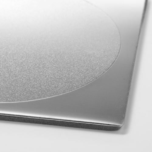 Close-up of IKEA GROGGY stainless steel coaster