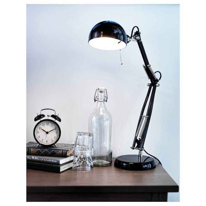 IKEA DEKAD Alarm clock in black color.