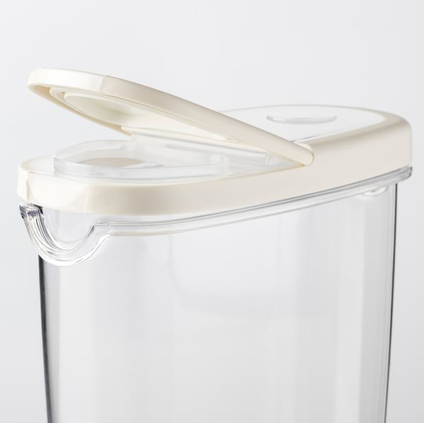 Clear container with a beige lid.