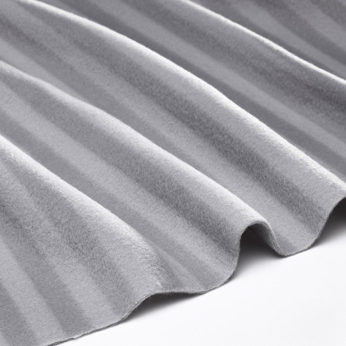 IKEA VITMOSSA fleece throw for sofa in grey color.