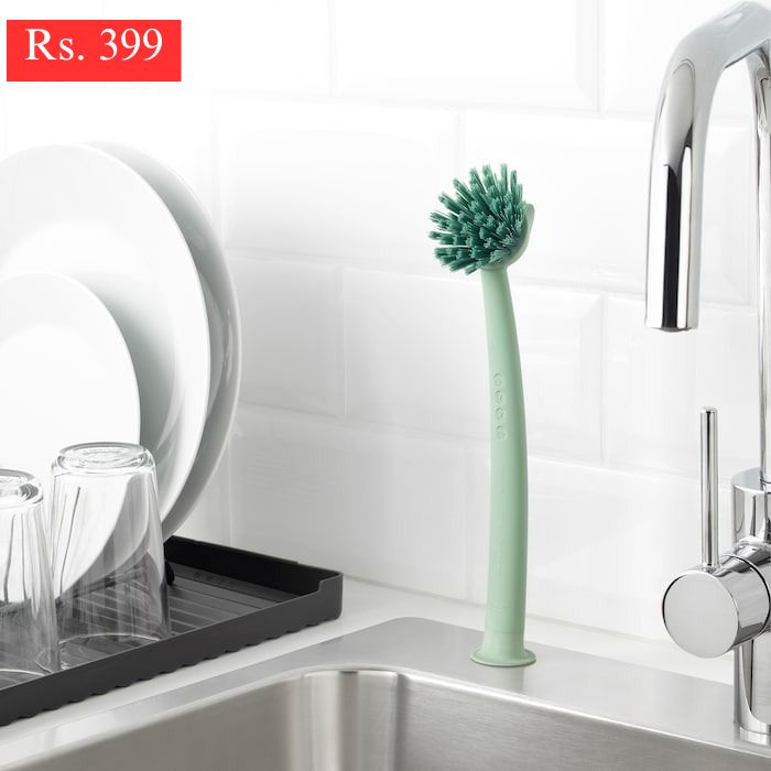 IKEA dish washing brush with suction cup.
