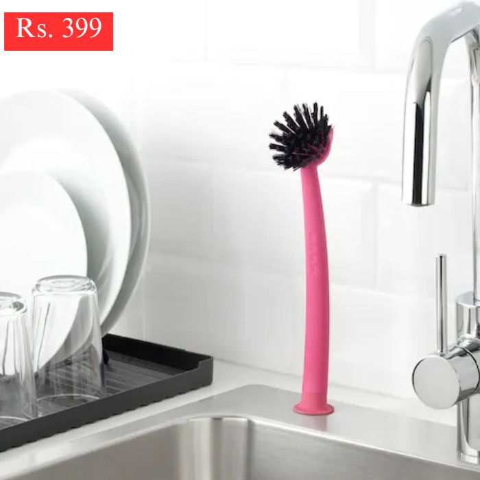 IKEA dish washing brush with suction cup.