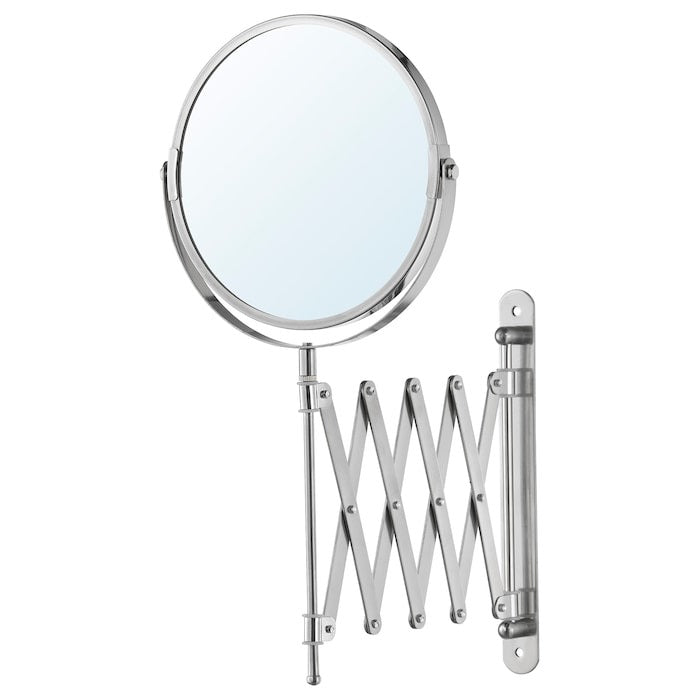 Foldable makeup mirror with round silver frame on a white background