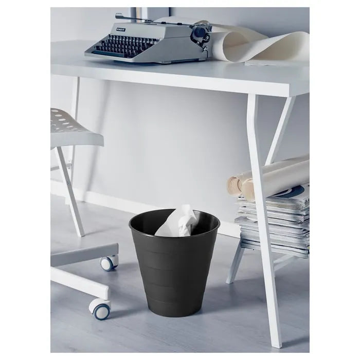 Modern black waste bin IKEA FNISS for home and office use.
