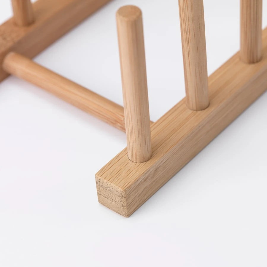Closeup of IKEA OSTBIT plate holder for kitchen storage
