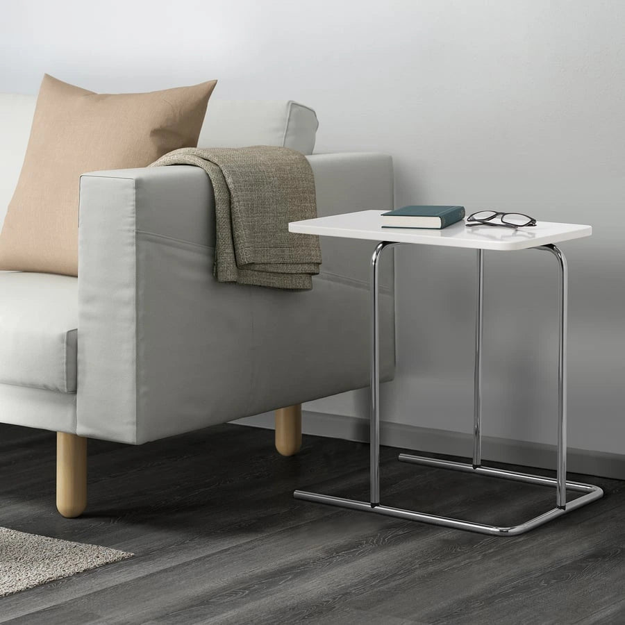 IKEA RIAN side table positioned beside a sofa