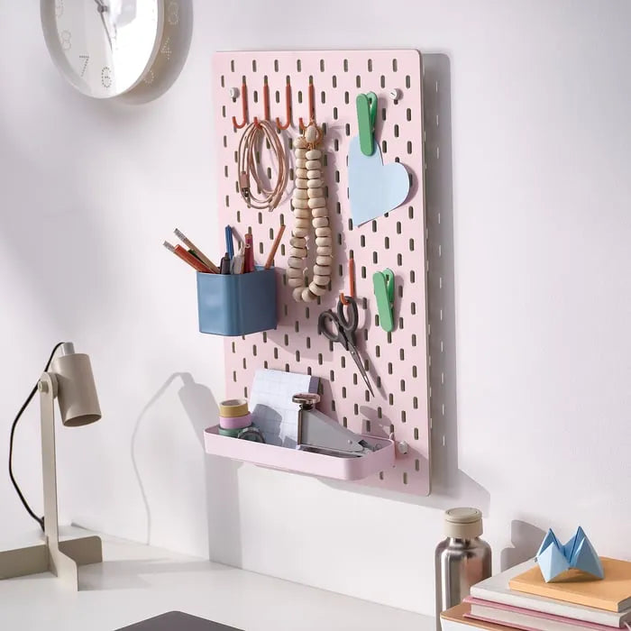 IKEA SKÅDIS beige pink pegboard for office or craft room.