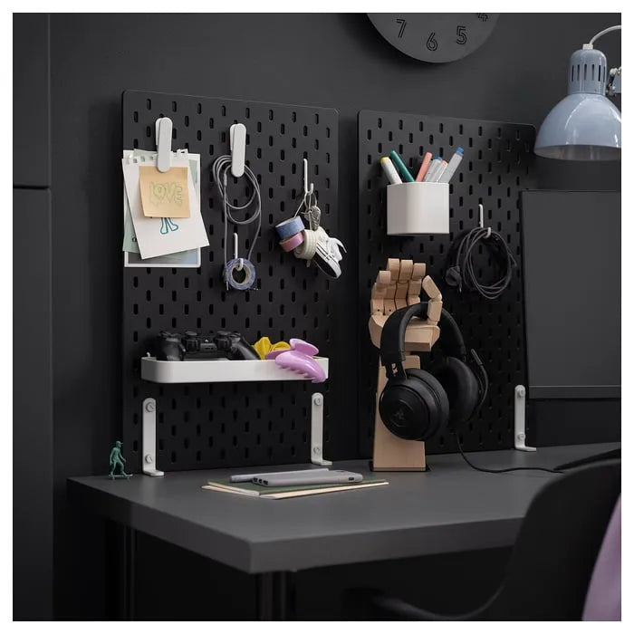 IKEA SKÅDIS series black pegboard home organization.