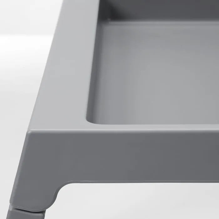 Closeup IKEA KLIPSK bed tray grey with foldable legs.