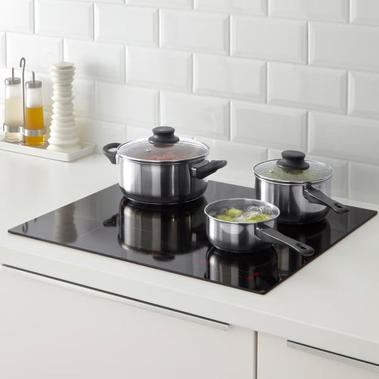 IKEA ANNONS 5 piece cookware set material is glass and stainless steel.