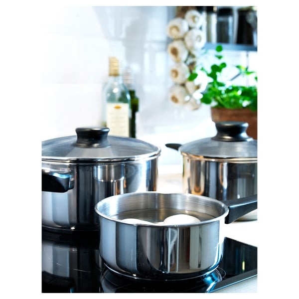 IKEA ANNONS 5 piece cookware set material is glass and stainless steel.