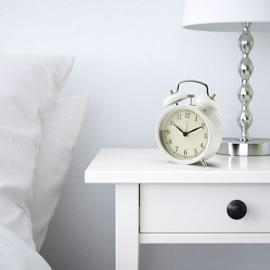 IKEA alarm clock in white color.