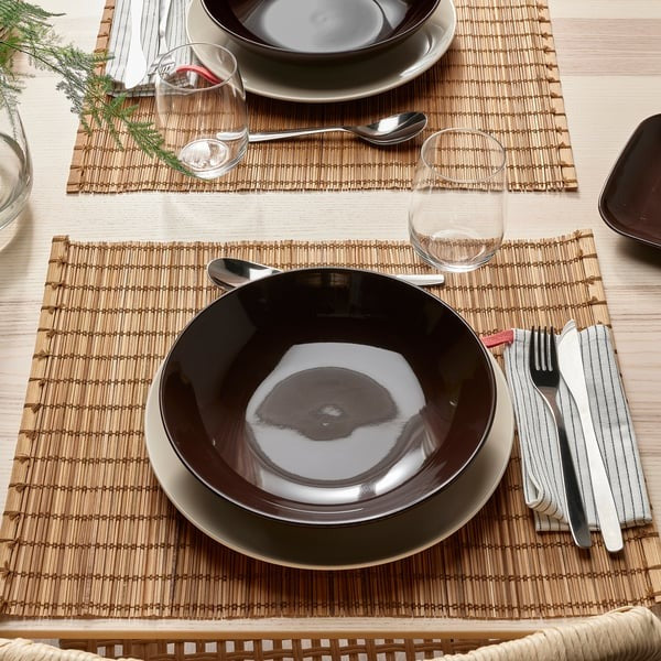 IKEA deep plate in glossy brown colour having size 23 cm.