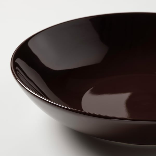 IKEA deep plate in glossy brown colour having size 23 cm.
