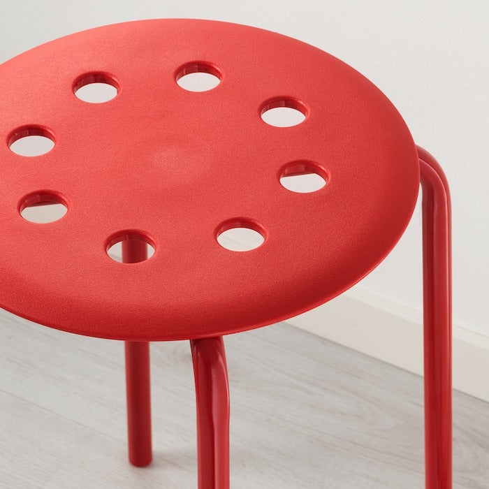 IKEA MARIUS stool in red color.