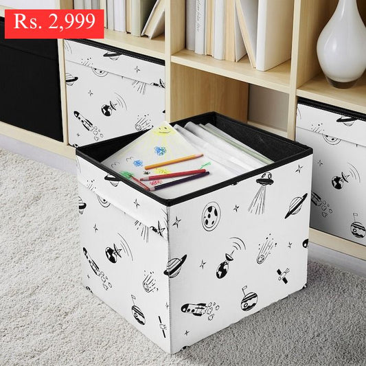 IKEA AFTONSPARV storage box with outer space design in black and white color.