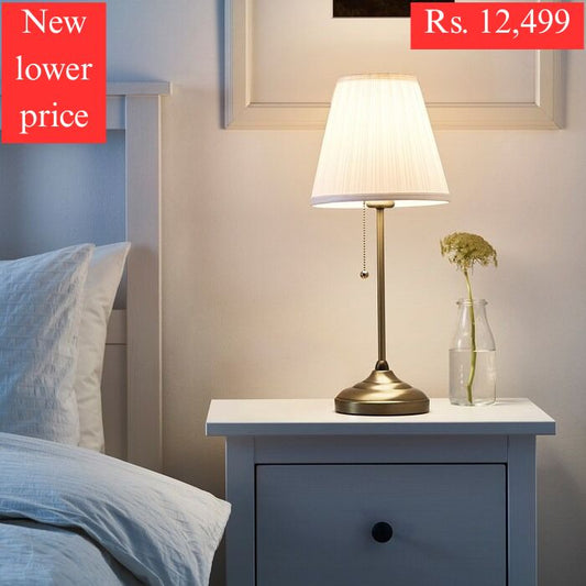 IKEA Table Lamp ARSTID in gold color.
