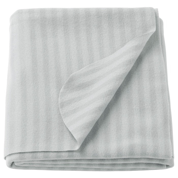 IKEA VITMOSSA fleece throw for sofa in grey color.