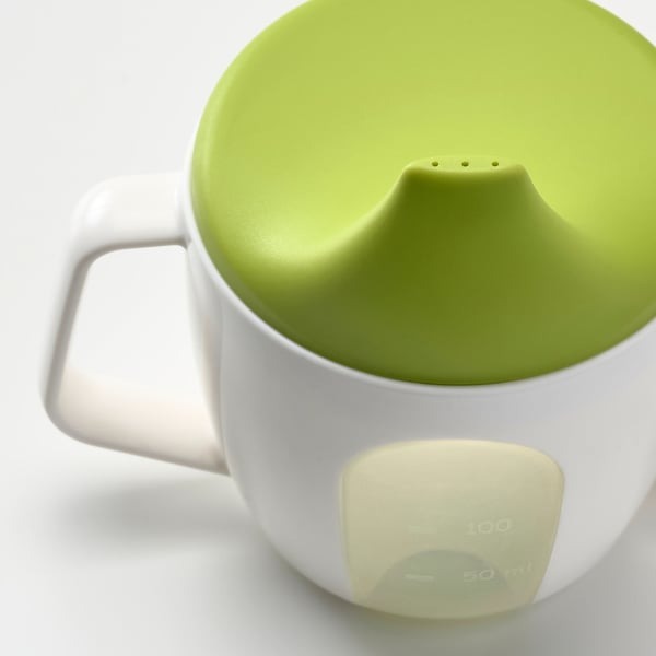 IKEA training beaker BORJA in green and white color.