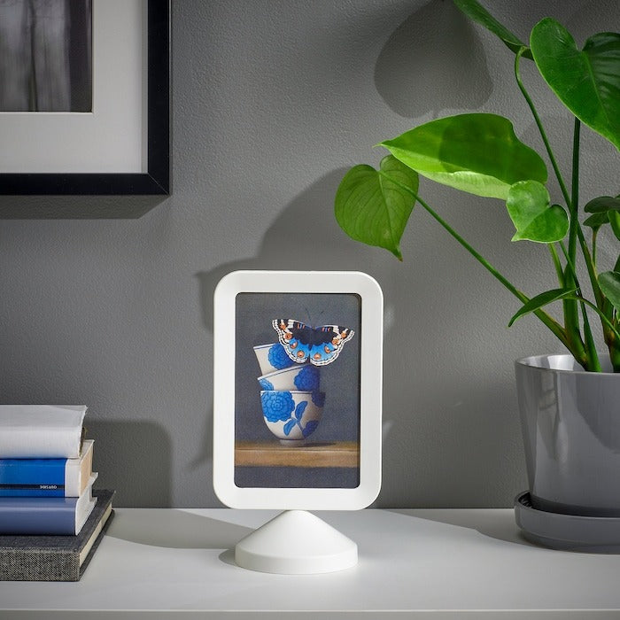 IKEA two sided photo frame in white color.