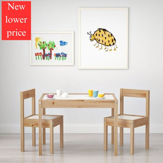 IKEA LATT children's table with 2 chairs.