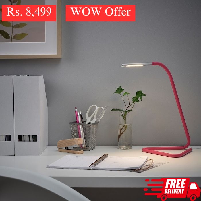 IKEA HARTE LED work lamp in bright pink and silver color.