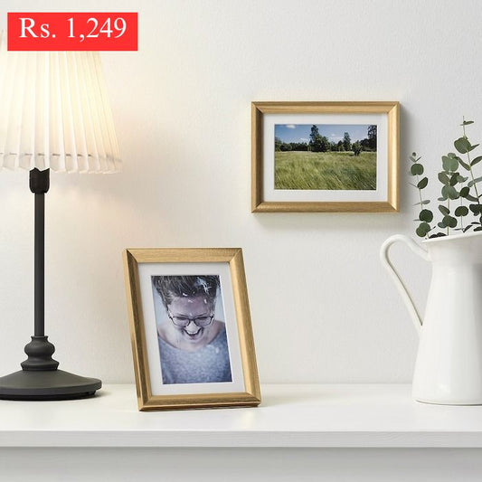 IKEA SILVERHOJDEN frame in gold color.