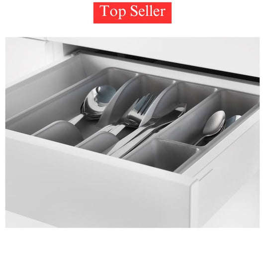 Silverware organiser in a drawer with cutlery.