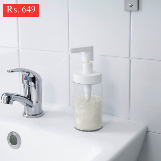 IKEA TACKAN glass soap dispenser in white color.