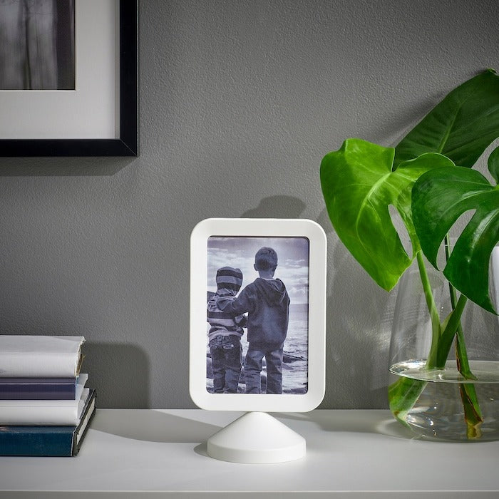 IKEA two sided photo frame in white color.