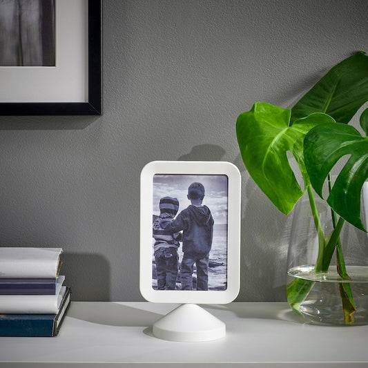 IKEA two sided photo frame in white color.