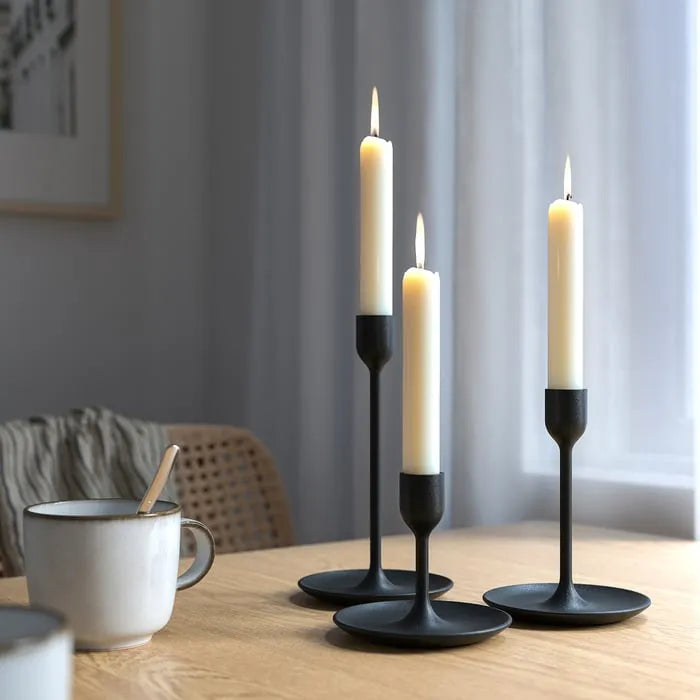 IKEA FULLTALIG black candlesticks on dining table
