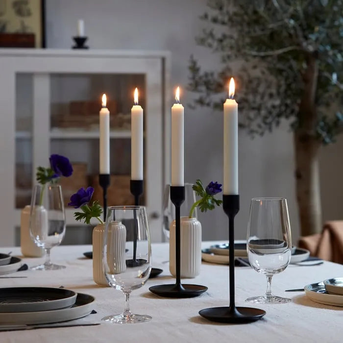 IKEA FULLTALIG black candlesticks on dining table