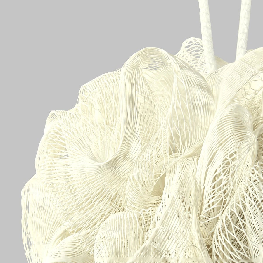 Close-up of IKEA ABYAN body puff texture white