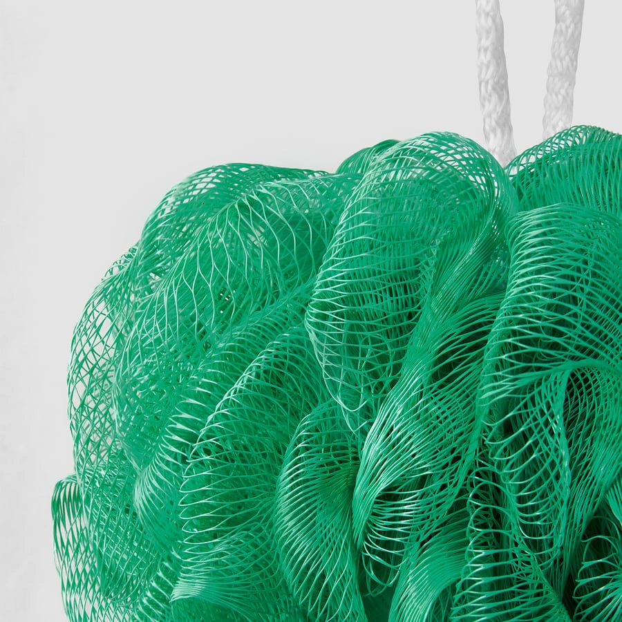 Close-up of IKEA ABYAN body puff texture green