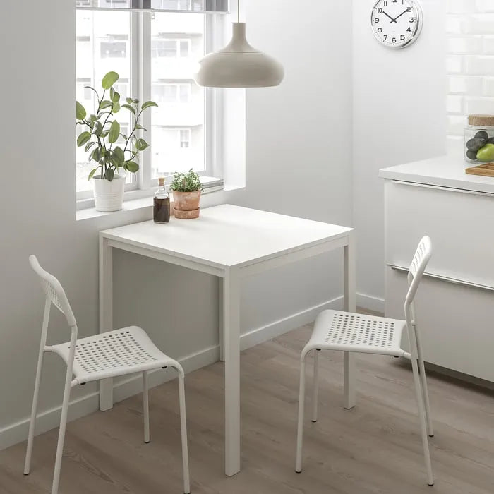 IKEA ADDE Chair White in kitchen dining room setup.