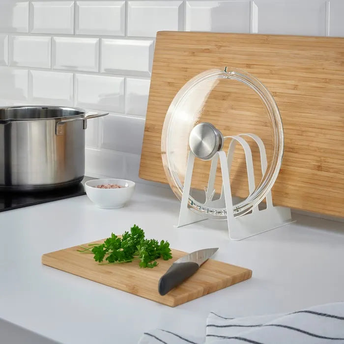 IKEA AVSTEG lid stand holding pot lids.