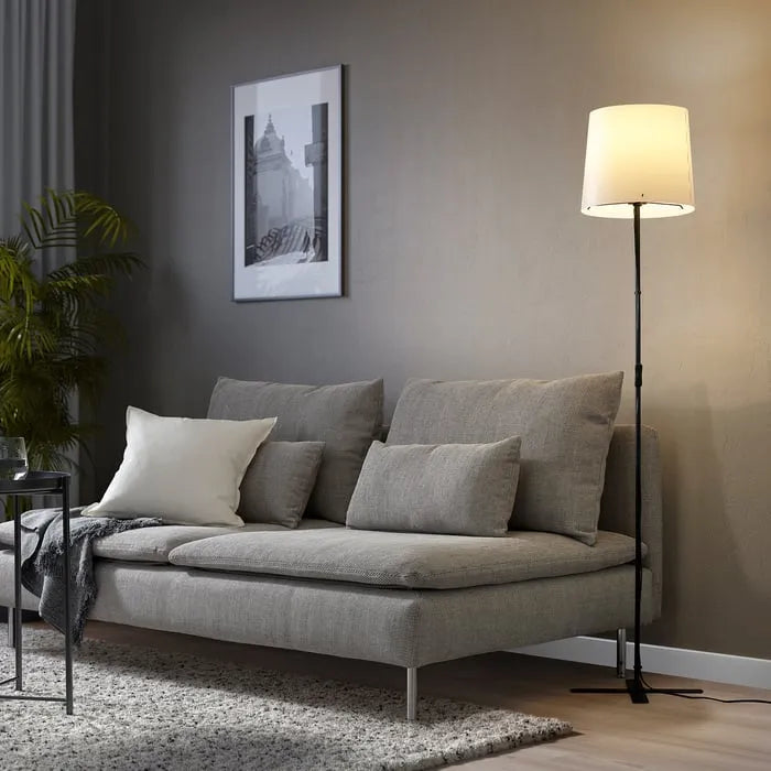 IKEA BARLAST floor lamp in living room interior.