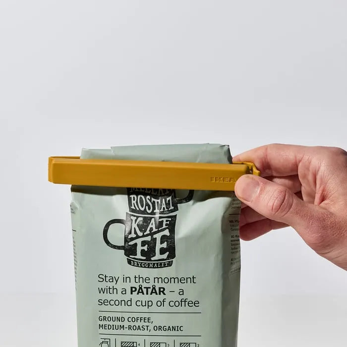 Close-up of IKEA BEVARA clip design anthracite and yellow.