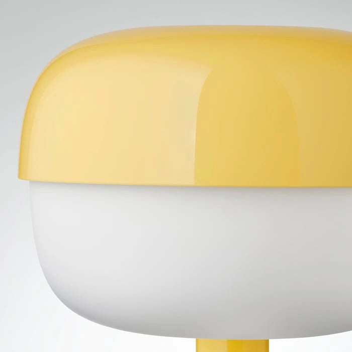 Close-up of IKEA BLASVERK yellow table lamp