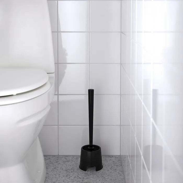 IKEA BOLMEN toilet brush and holder placed in bathroom.