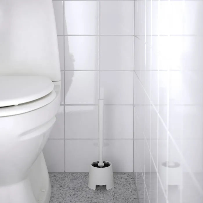 IKEA BOLMEN toilet brush and holder placed in bathroom.