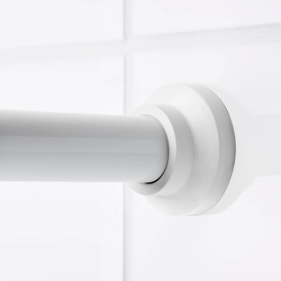 Close-up of IKEA BOTAREN white shower curtain rod