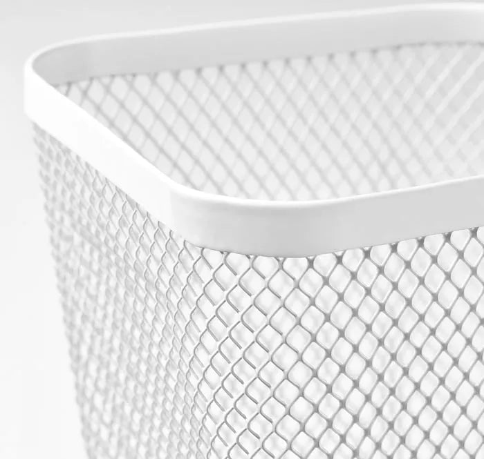 Close-up of IKEA DRONJONS white makeup cup.
