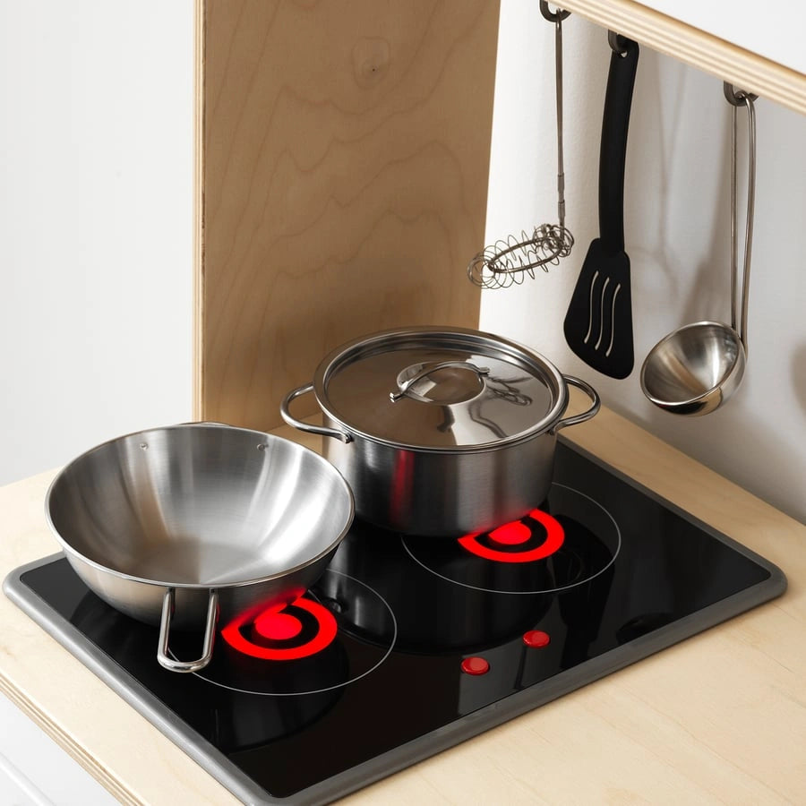Close-up of IKEA DUKTIG stove sink and oven