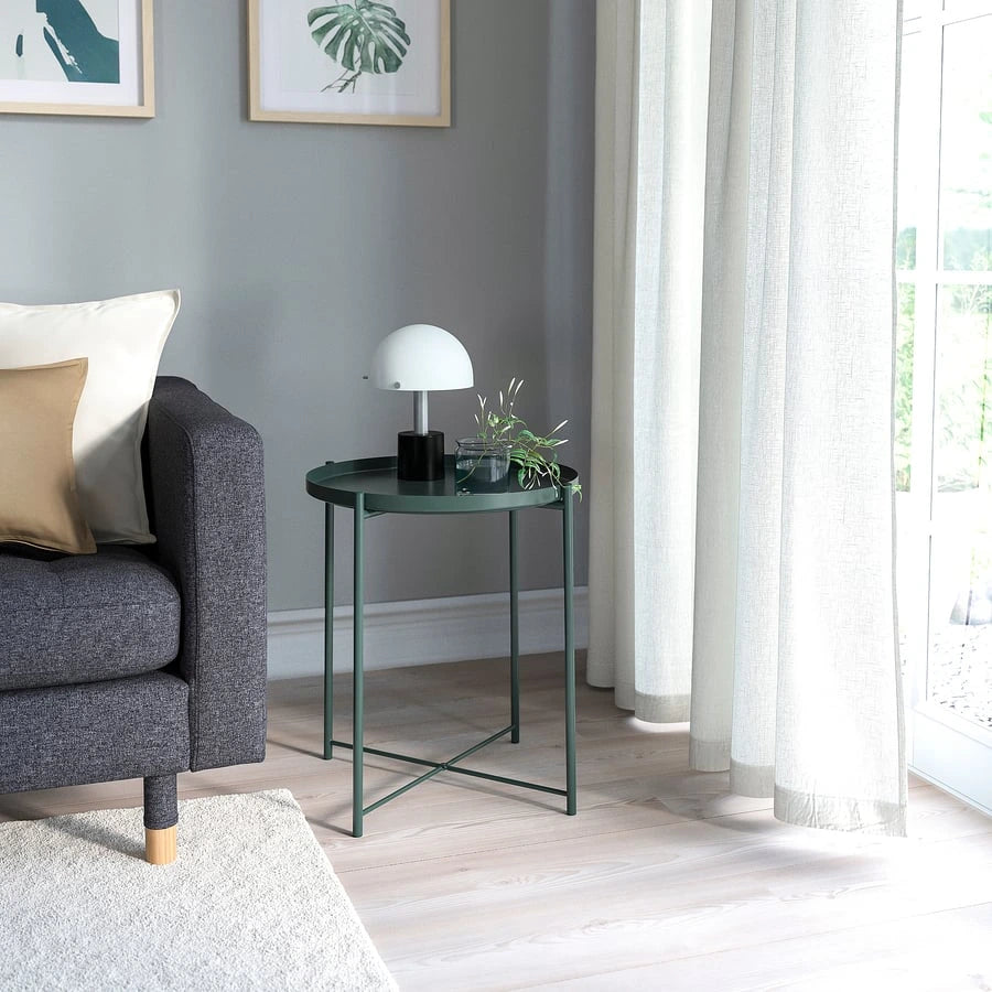 IKEA GLADOM tray table positioned beside a sofa