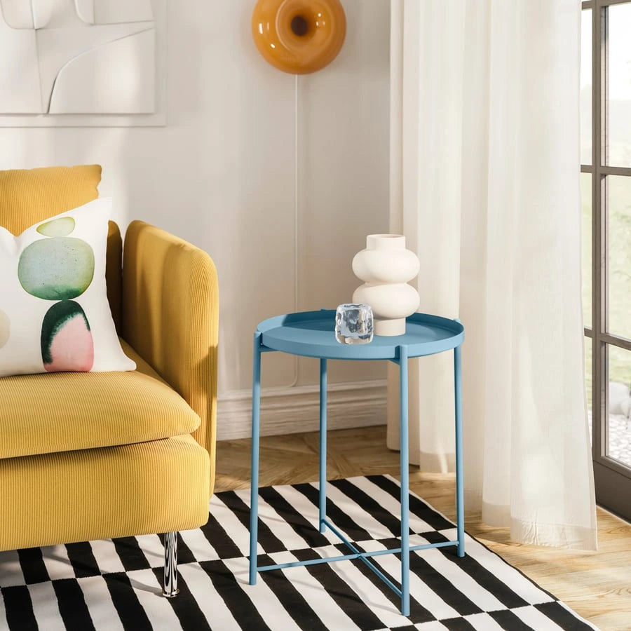 IKEA GLADOM tray table positioned beside a sofa