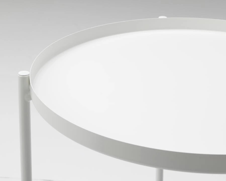 Close-up of the tray surface on IKEA GLADOM table