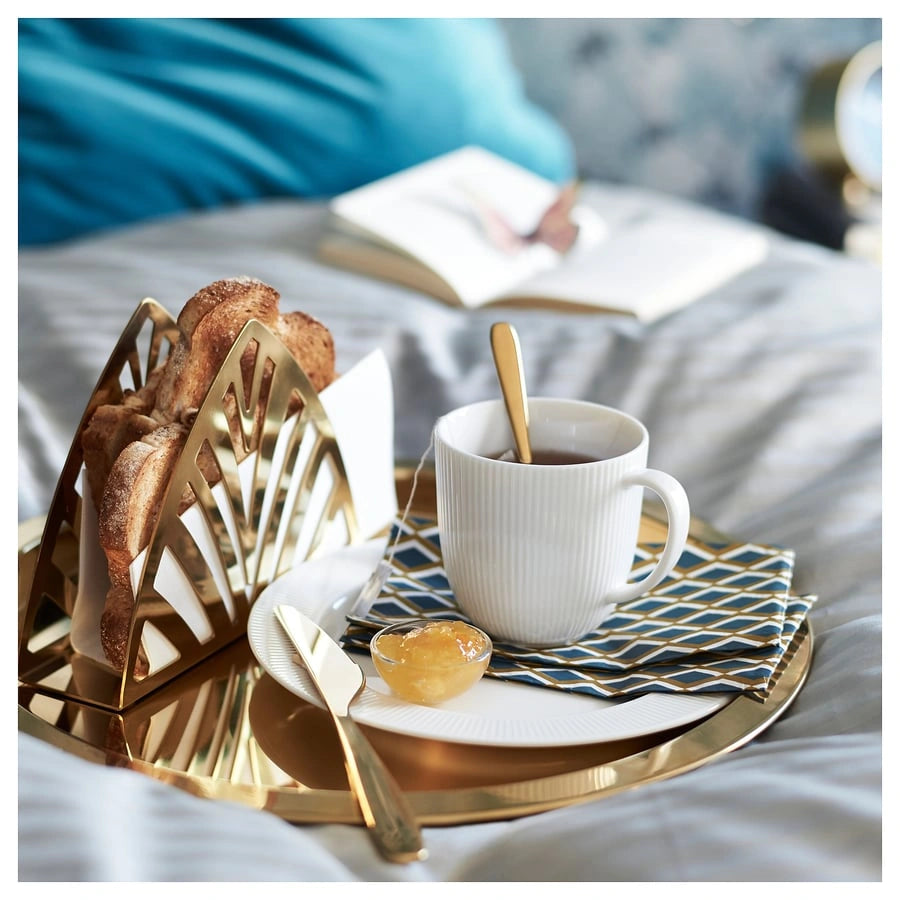 Close-up of IKEA GLATTIS stainless steel tray serving breakfast