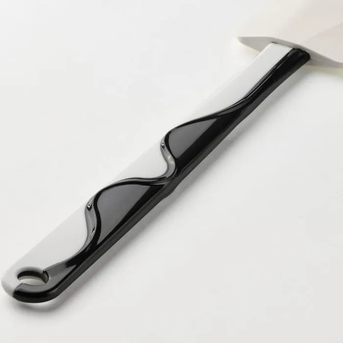 Close-up of IKEA GUBBRÖRA Silicone Rubber Spatula black and white.